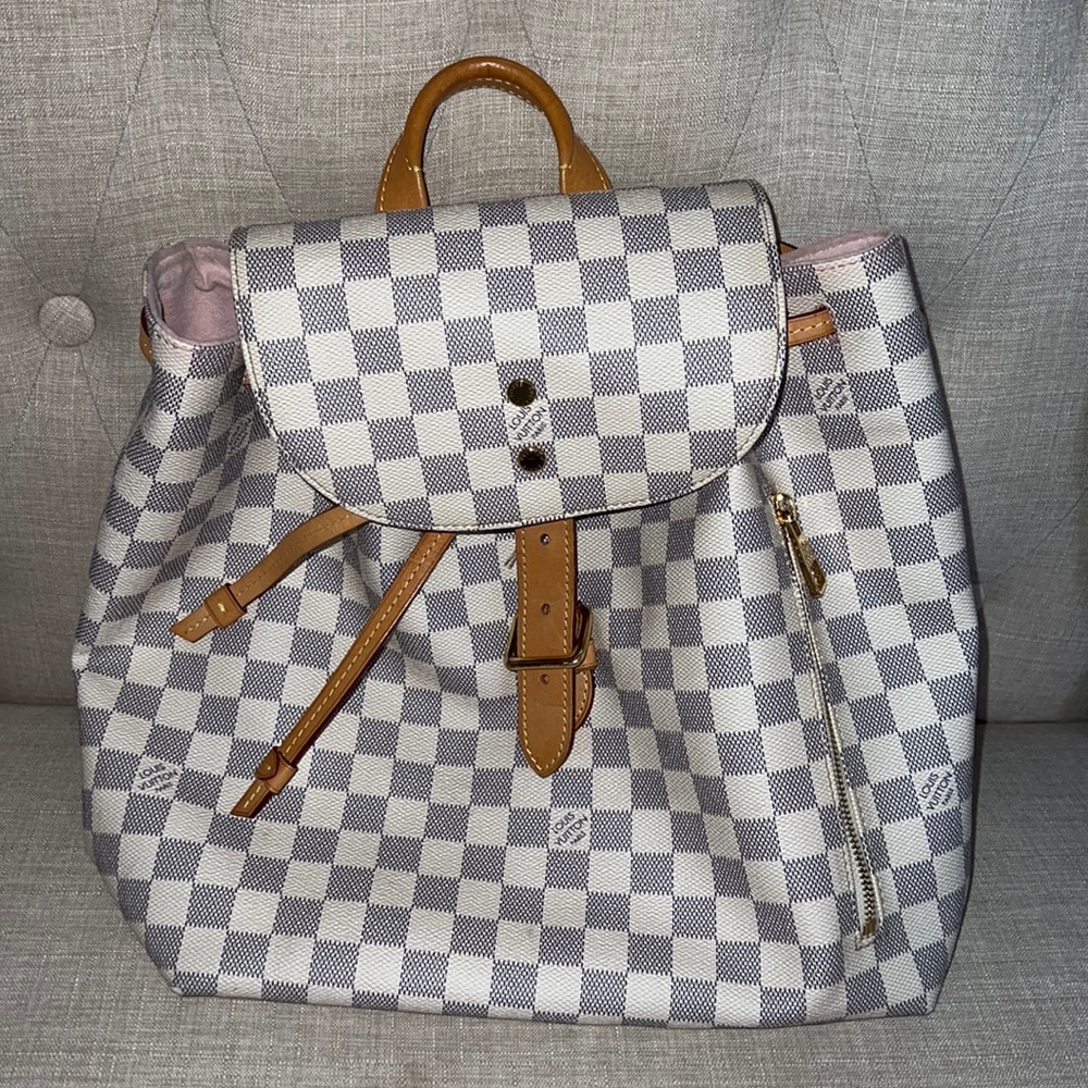 LOUIS VUITTON
Damier Azur Canvas Sperone Backpack - Multicolor